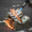 A stack of hundred-dollar bills set on fire, symbolizing wasted money on vanity publishing scams.